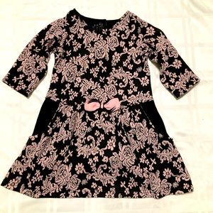 Fancy but comfy girls swing dress size 4. Black with Pink flowers.